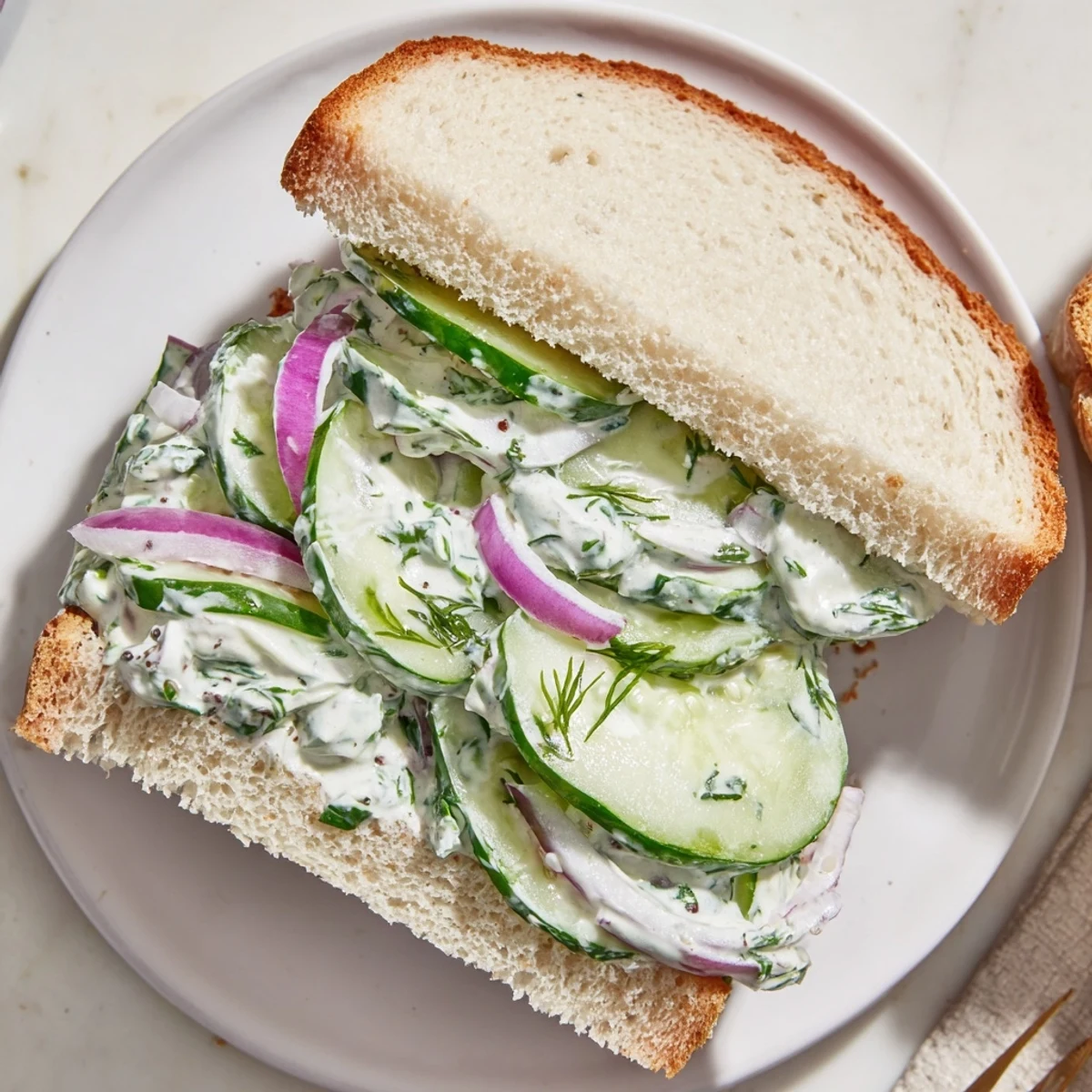 Tea-ready Quick Cucumber Salad Sandwiches with trimmed crusts, tender bread, crunchy cucumber