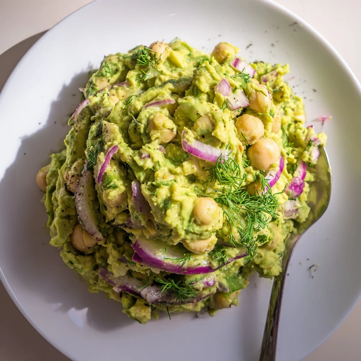Smashed Chickpea Avocado Pickle on toast, creamy, tangy, with crunchy pickles